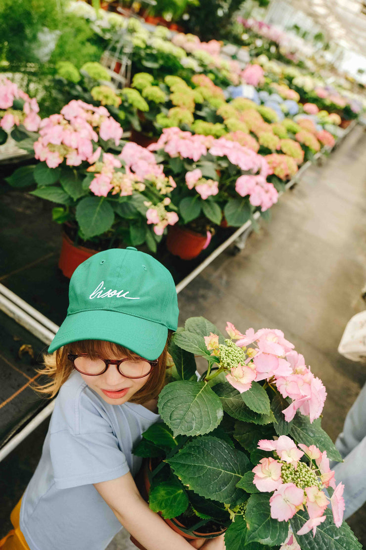 Green Bisou cap